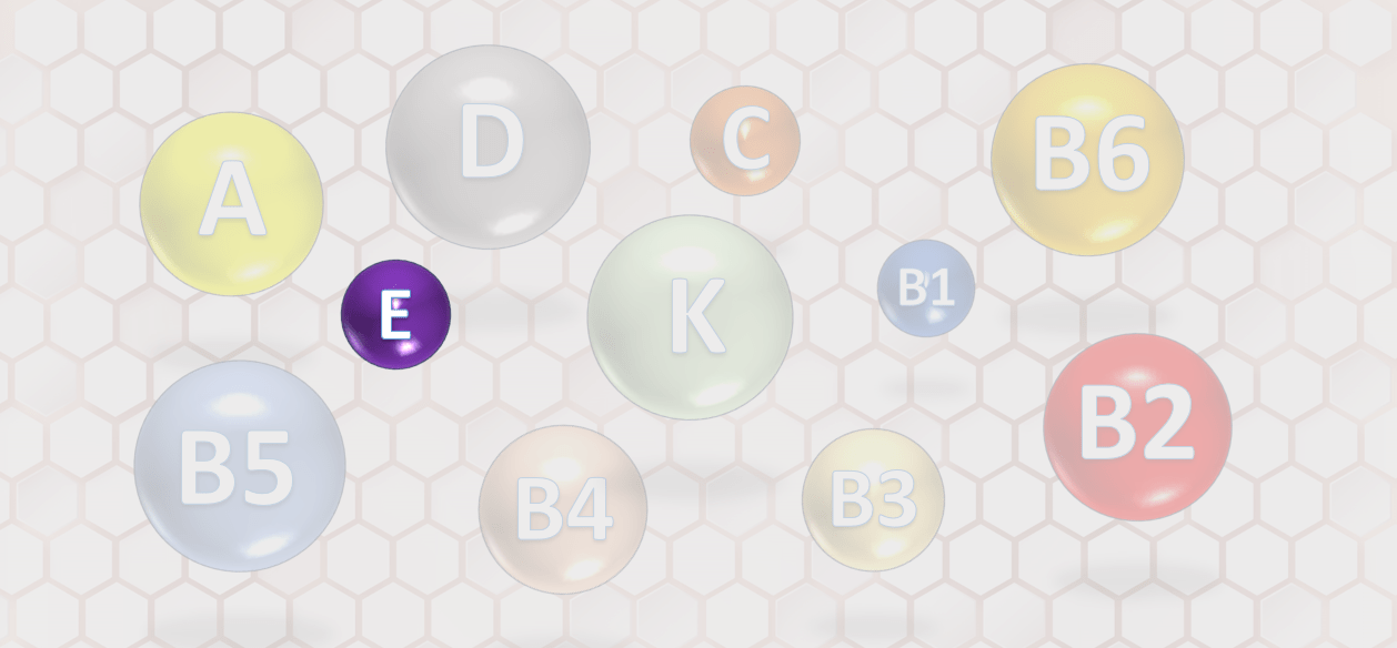 Círculos representando diferentes vitaminas con un círculo morado prominente destacando la vitamina E